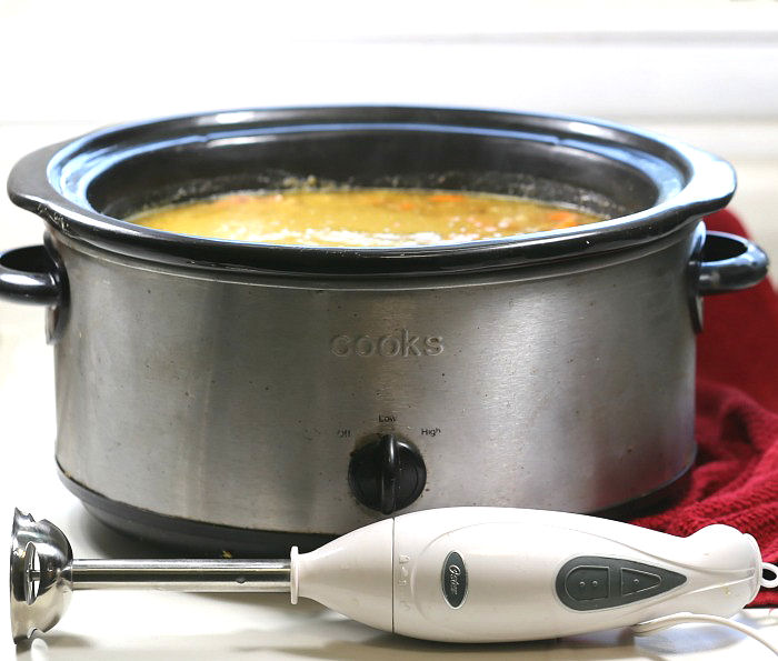 Use an immersion blender to make this crockpot split pea soup with ham very smooth