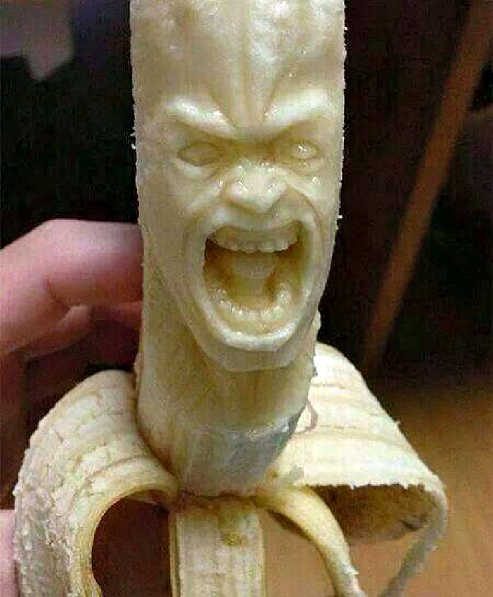 Banana carving of a scary face.
