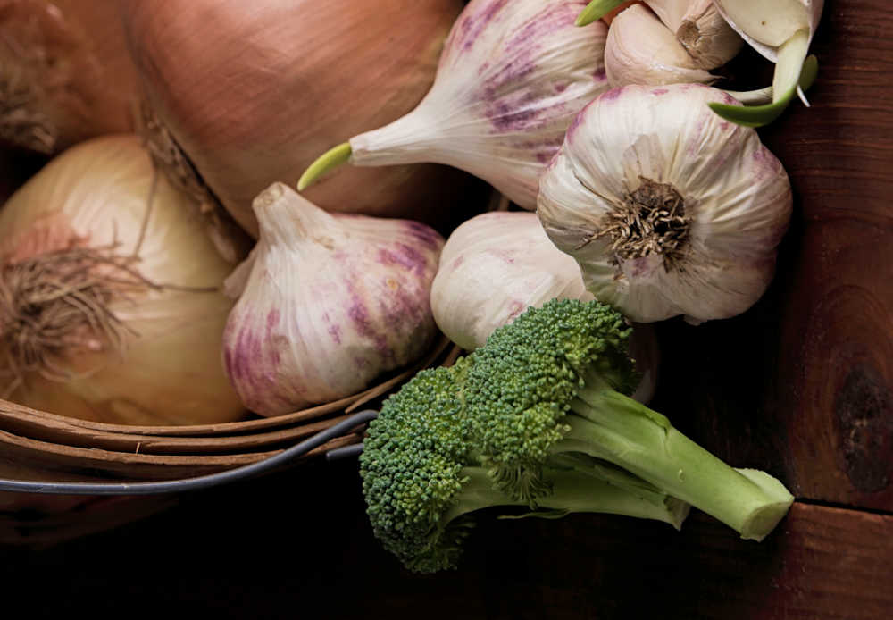 broccoli head with onions and garlic.