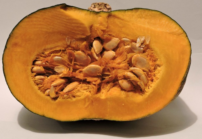 Scoop out your pumpkin seeds and roast them.