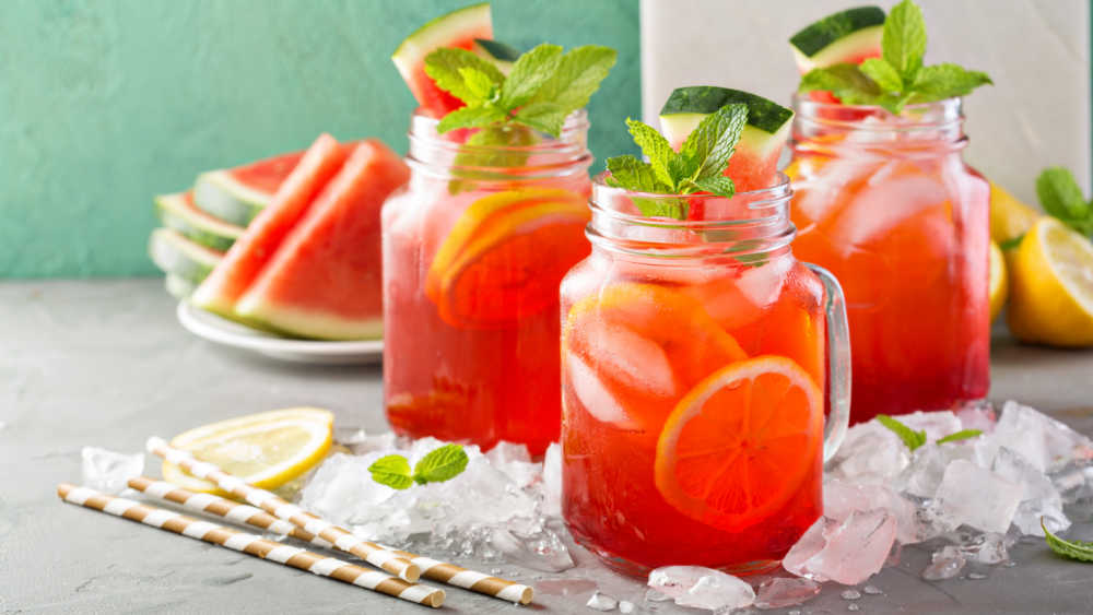Raspberry Watermelon Lemonade in Mason Jars.