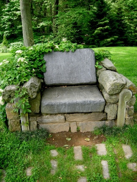 backyard retreat ideas stone chair
