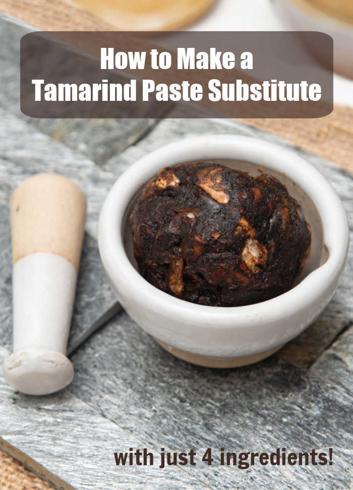 Tamarind paste in a bowl with a pestle with text reading "How to make a tamarind paste substitute with just 4 ingredients."
