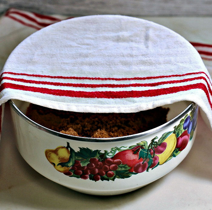 Damp towel over a bowl of brown sugar