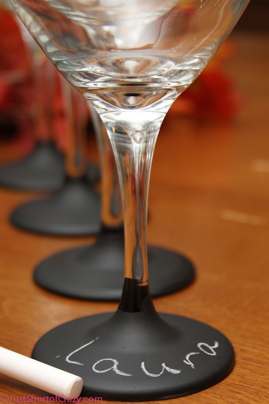 Wine glasses dipped in chalk board paint.