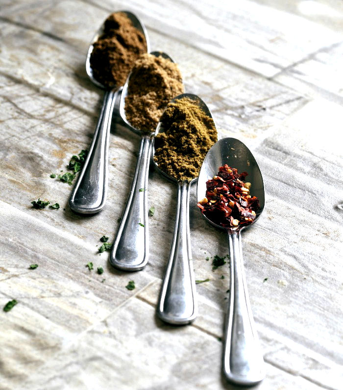 Indian spices on spoons