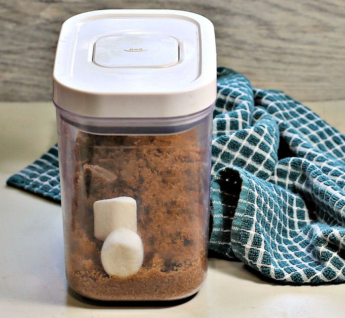 Add two marshmallows to brown sugar to soften it