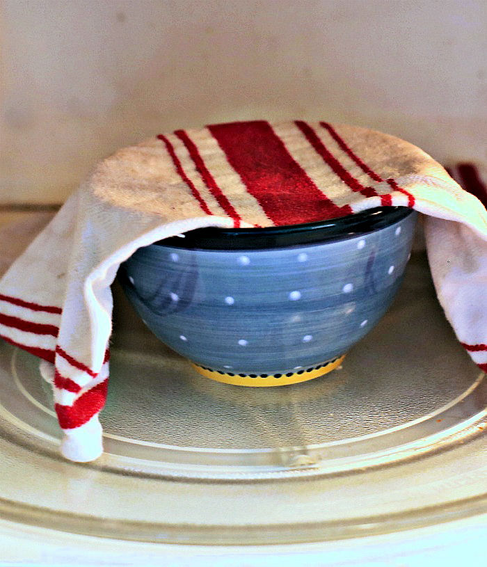 Damp tea towel on a bowl of brown sugar in the microwave will soften it
