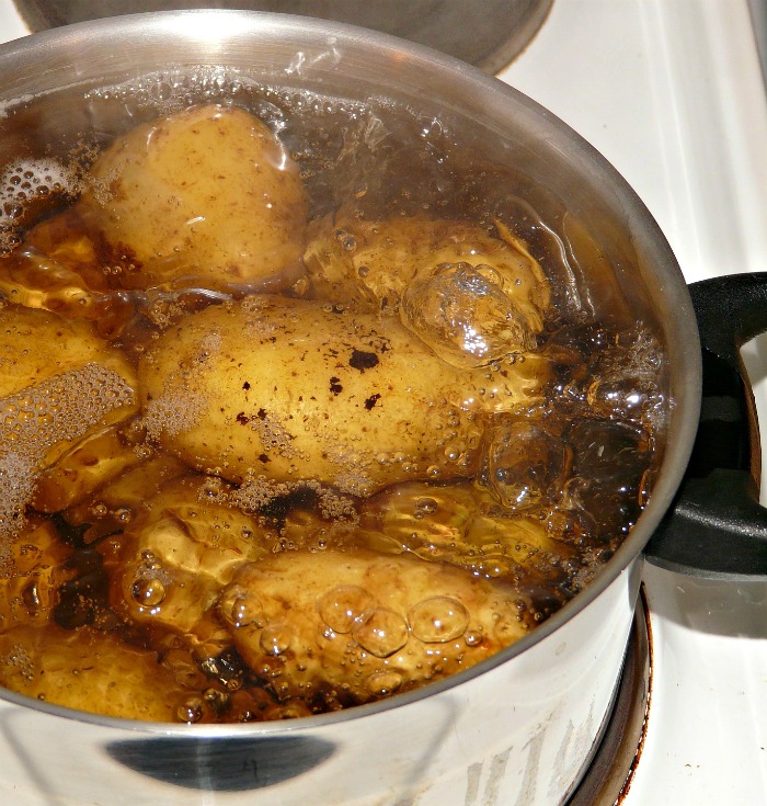 Potatoes boiling in water
