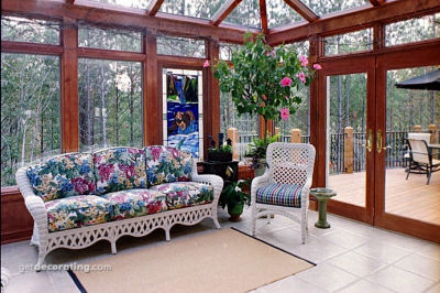 Floral sofa in a big sunroom