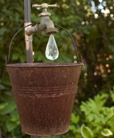 Rusty Galvanized bucket and Tear Shaped craft bead from eachlittleworld.typepad.com