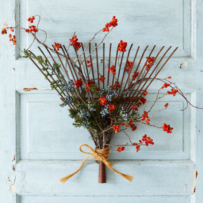 Old rake head and decorations = a fall door decoration.