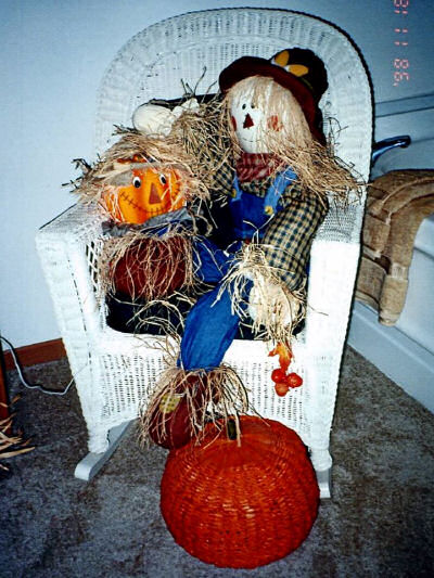 Pumpkin in a chair. Fabulous fall decor!