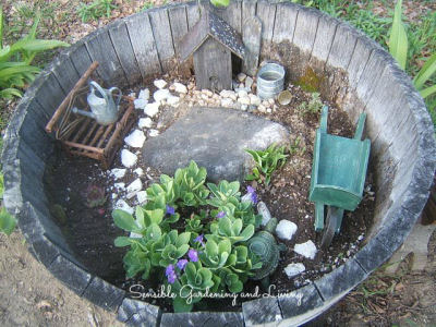 Mini Garden scene in a wooden barrel planter