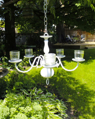 Outdoor chandelier with mason jar lighting.