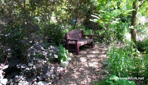 Seating area in a shady walkway.
