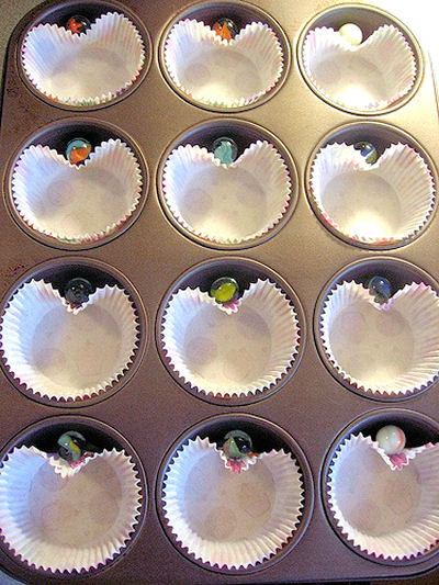 Add a marble at the top of your cupcake liners to make heart shaped cupcakes.