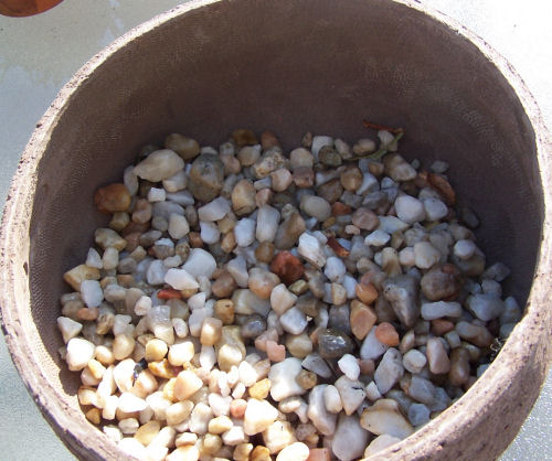Planter with rocks for drainage
