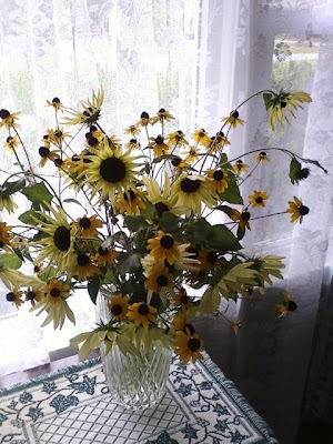 Sunflowers say good bye to Jess