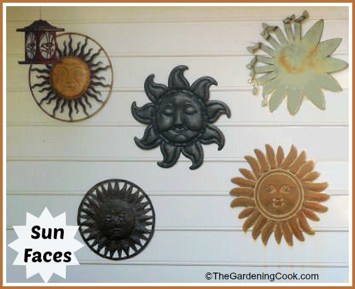 Sun Faces on a Garden shed wall