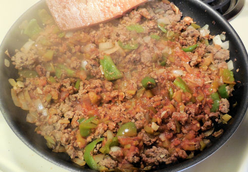 beef and peppers cooking