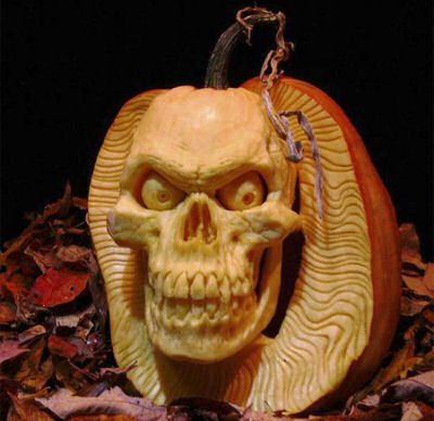 Skeleton head pumpkin carving by Ray Villafane