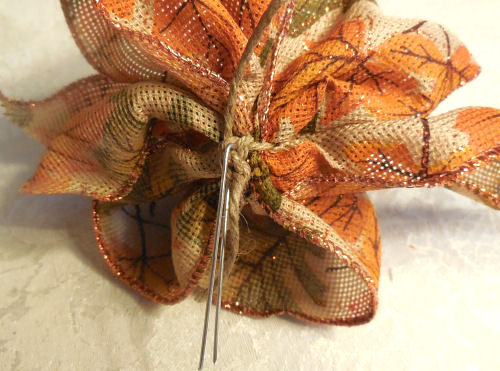 floral pick in bow