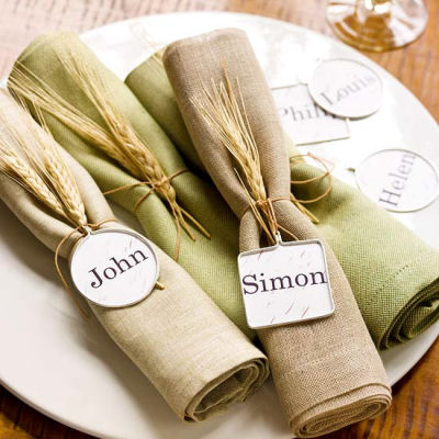 Napkin rings and place holders in one. So rustic with the wheat!