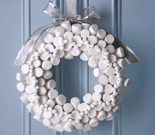 Marshmallow wreath from foodnetwork.com on a light blue door.