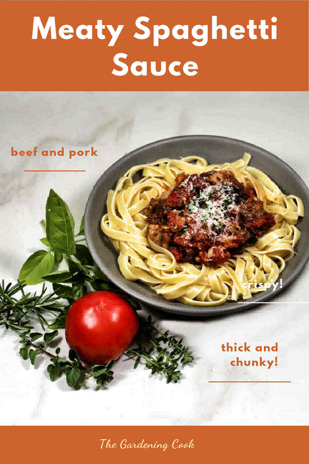Bowl of fettuccini with meaty spaghetti sauce near a tomato and herbs with text reading Meaty Tomato Sauce.