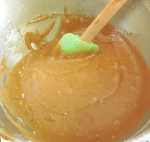 flour added to the butter and sugar and eggs