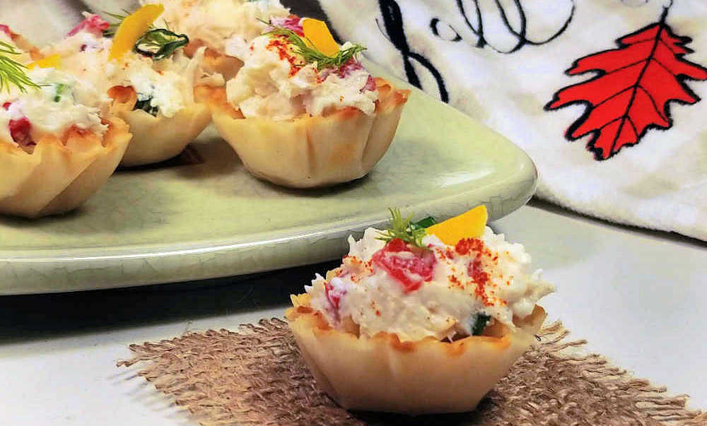 Phyllo cups filled with crab and cream cheese.