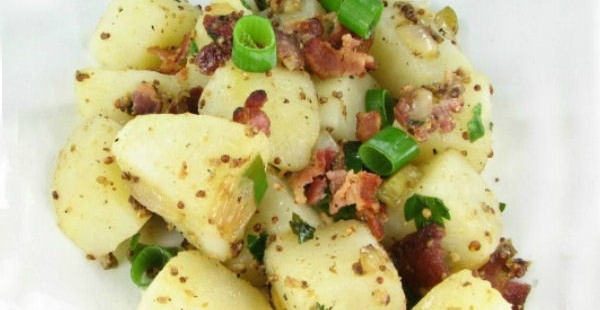 Traditional German potato salad recipe with bacon and pickles