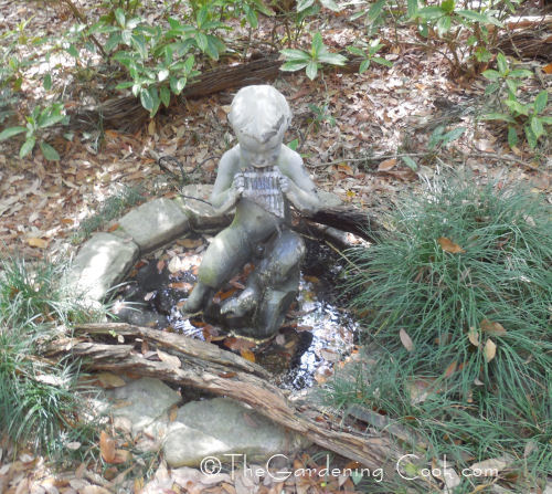 Pan statue in a water feature