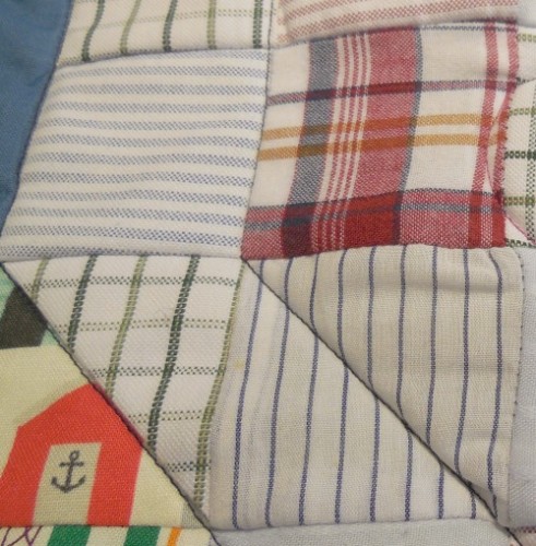 Old shirts form squares of the memory square