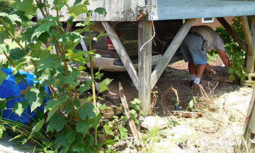 Jacking up the back of the truck.