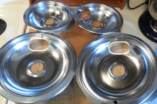Burner dip pans after cleaning with ammonia.