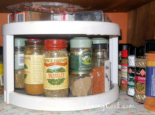 Lazy Susan keep spice jars handy.