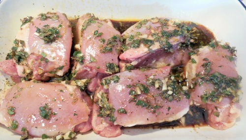 pour the marinade over the chicken thighs