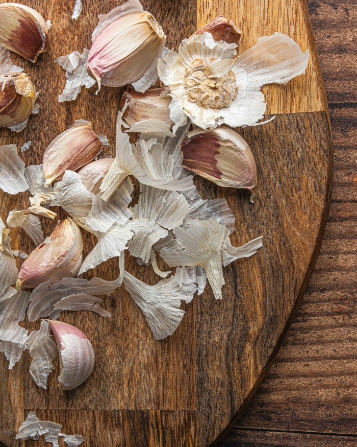 Garlic cloves on a cutting board