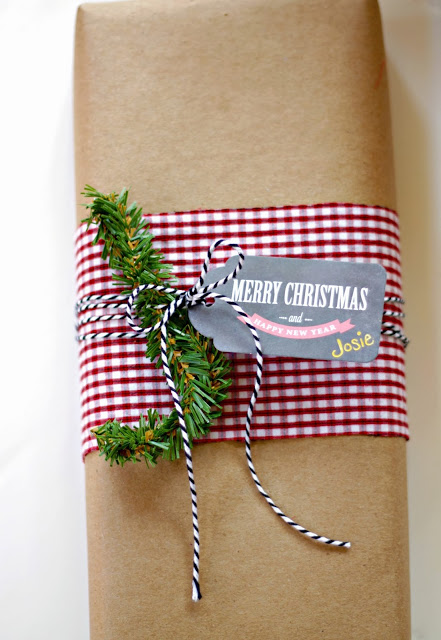 Plain brown paper all dressed up from creatingreallyawesomefreethings.com for a Christmas package.