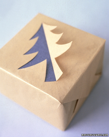  Purple and white tree topper on brown paper gift from marthastewart.com.