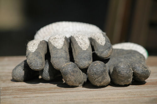 Clean garden gloves before storing for the winter