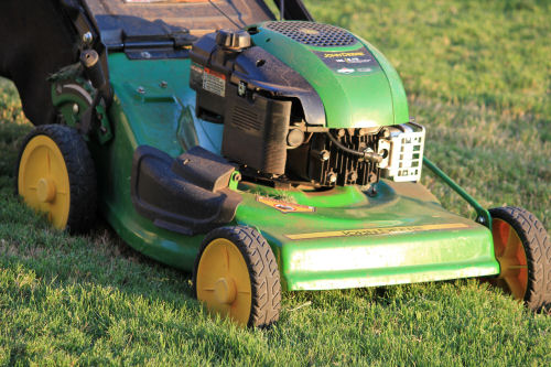 Winterize garden tool. Drain oil from lawnmowers