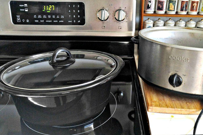Use the liner of a crock pot to reheat the food in the oven (not in the crock pot itself)