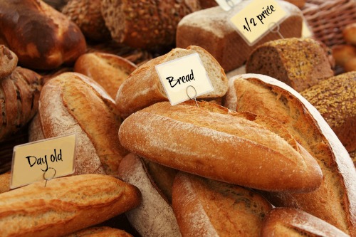 shop early in the day for day old bread and late in the day for mark down meat