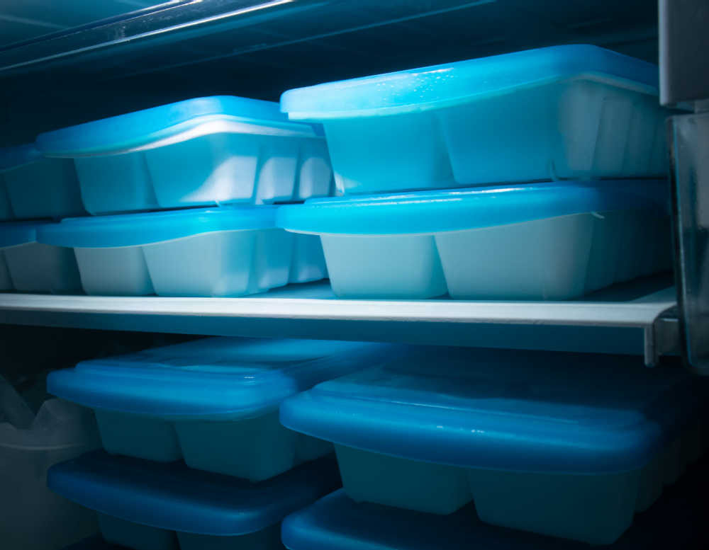 Silicone ice cube trays in the freezer.