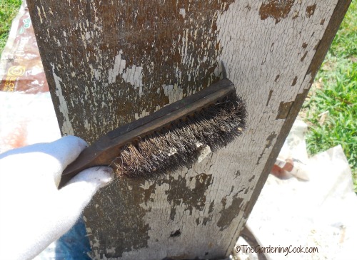 Wire brush removes old paint