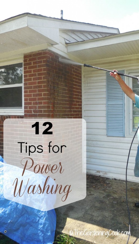 Man with a power washing hose and words 12 power washing tips.