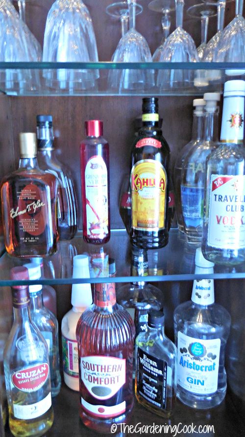 I keep my home bar on shelving in my china cabinet